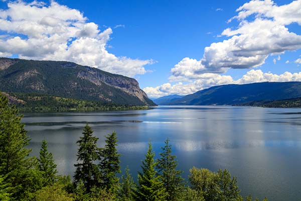View of Shuswap lake with mountains in background. 